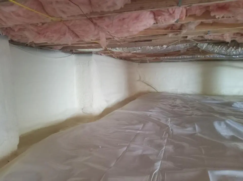 Crawl space encapsulation with closed-cell spray foam for Commercial Roof Restoration in Plover